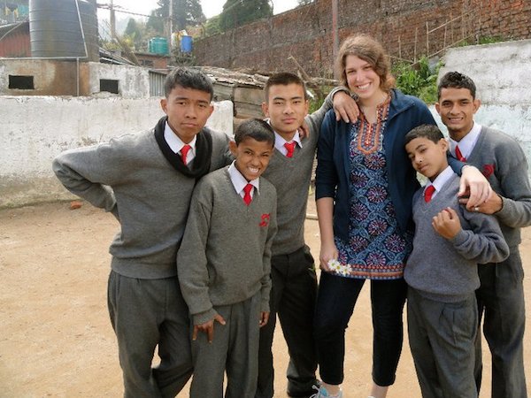 Bethany Flanders with students in Asia