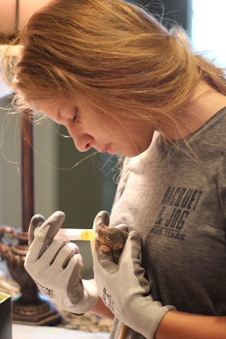 Rachel feeding a squirrel