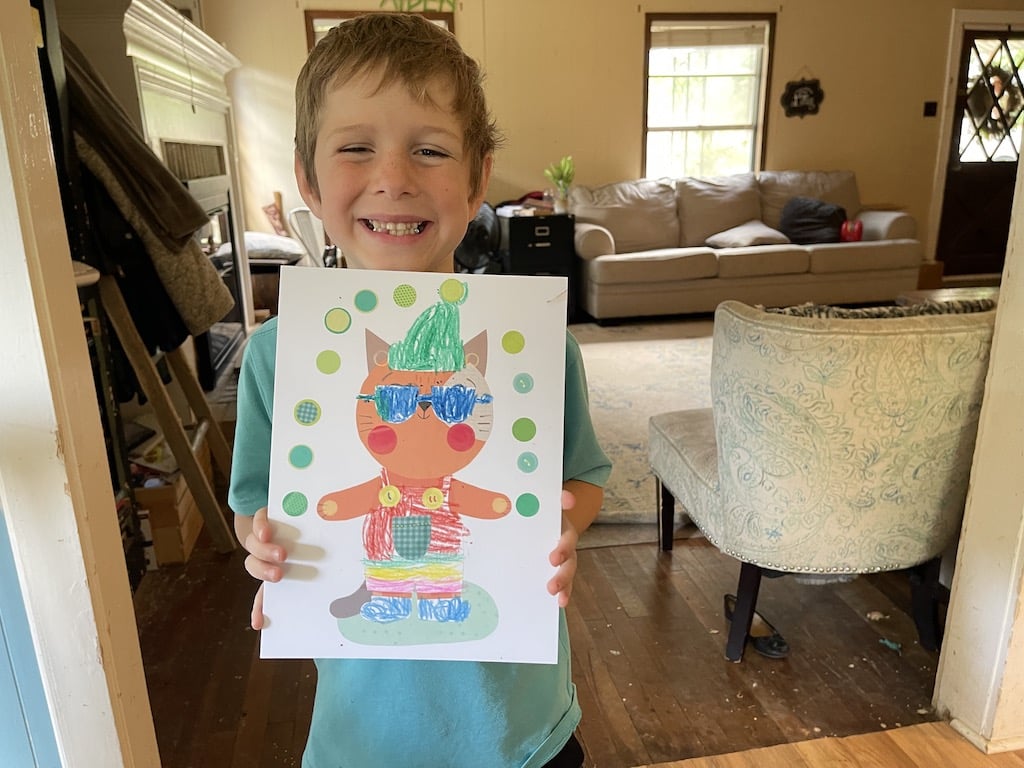 Noah shows his artwork