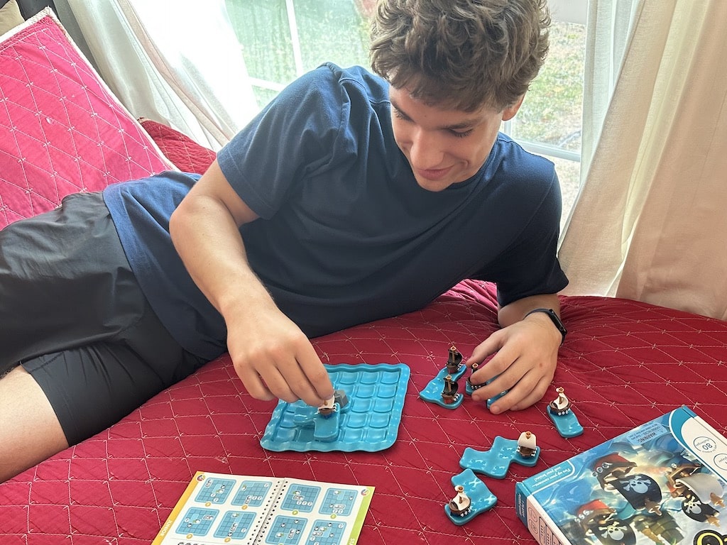 boy working on puzzle