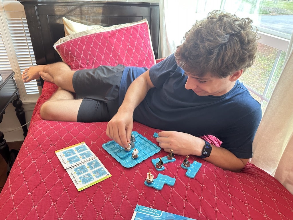 boy working on puzzle