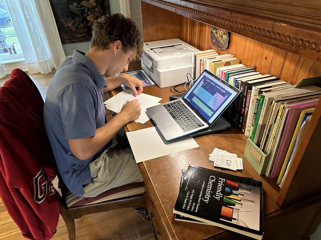 Daniel Studying at Desk 