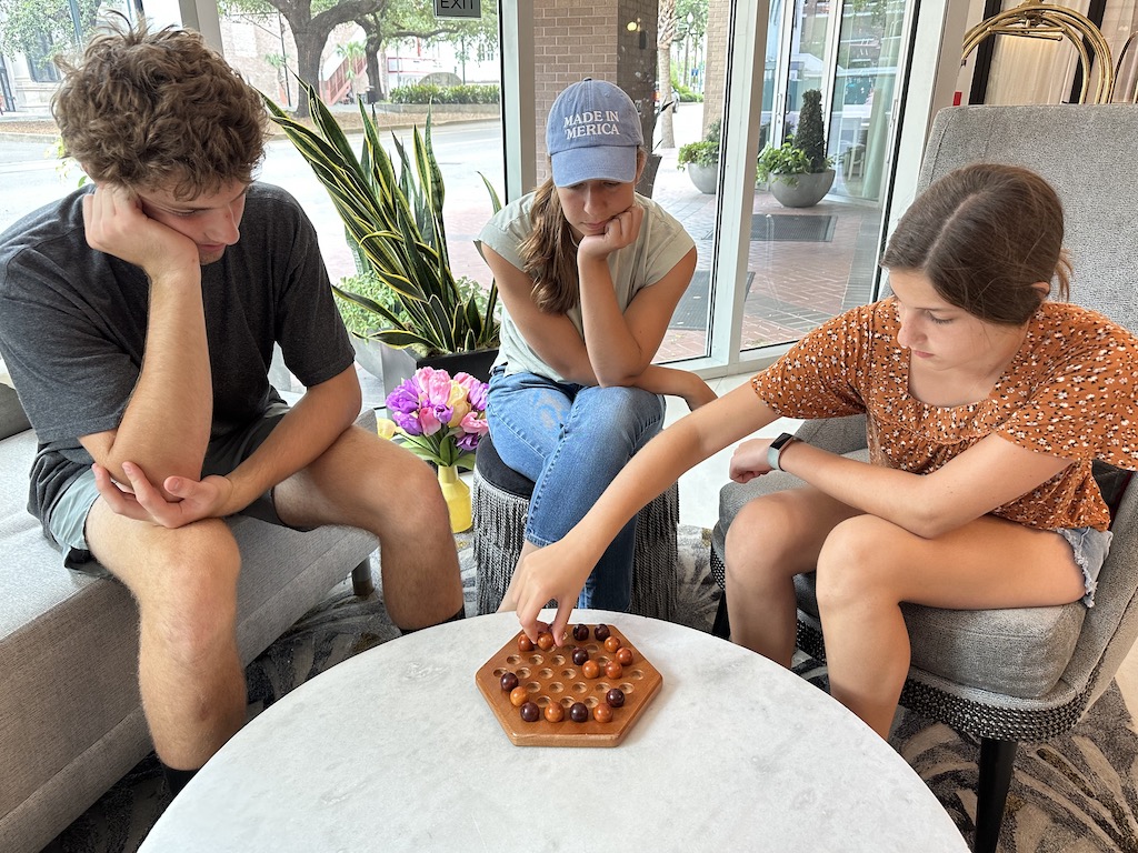 Three Kids Playing Boardgame