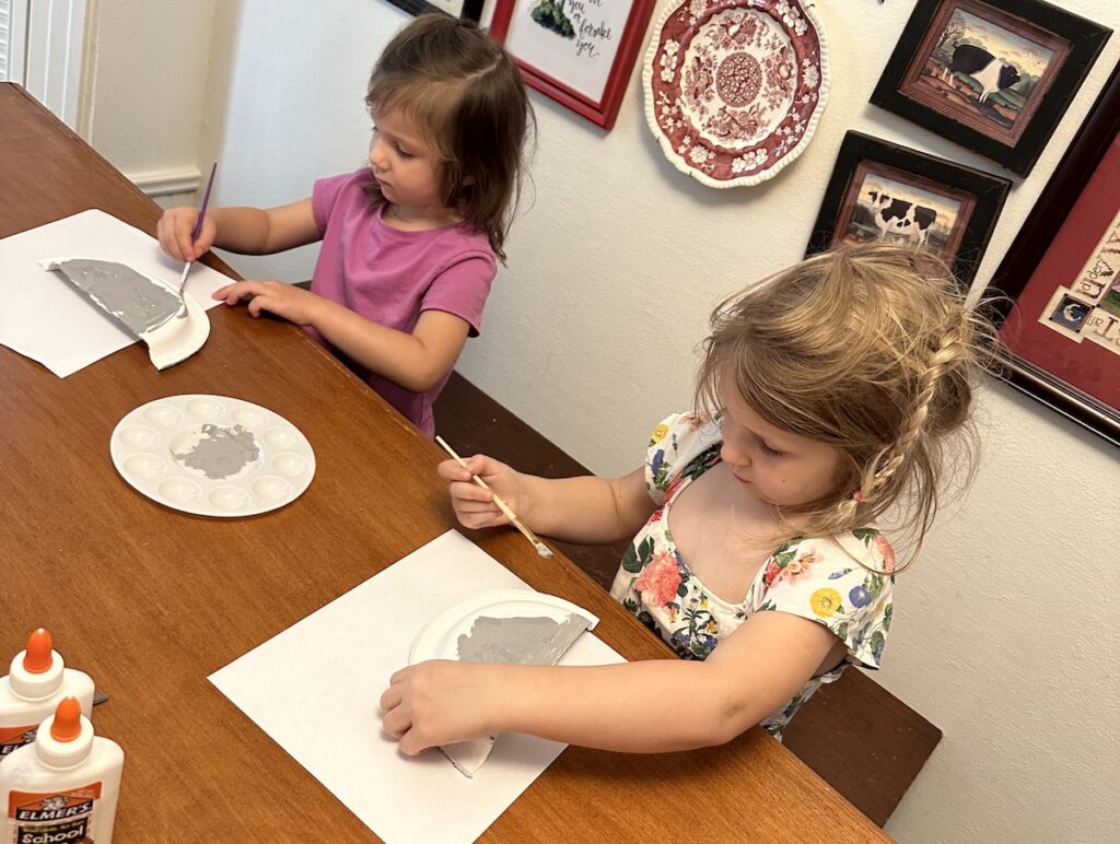 Two Children Painting